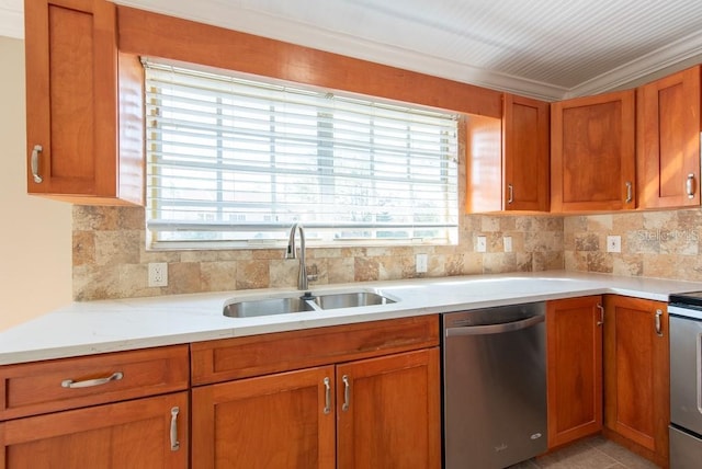 kitchen with crown molding, sink, decorative backsplash, and appliances with stainless steel finishes