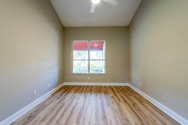 unfurnished room featuring ceiling fan and light wood-type flooring