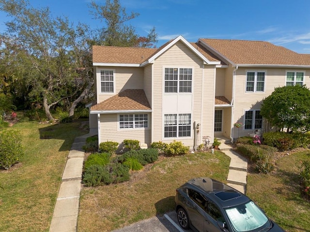 view of front of home featuring a front yard