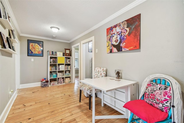 office space with crown molding, wood-type flooring, and a textured ceiling