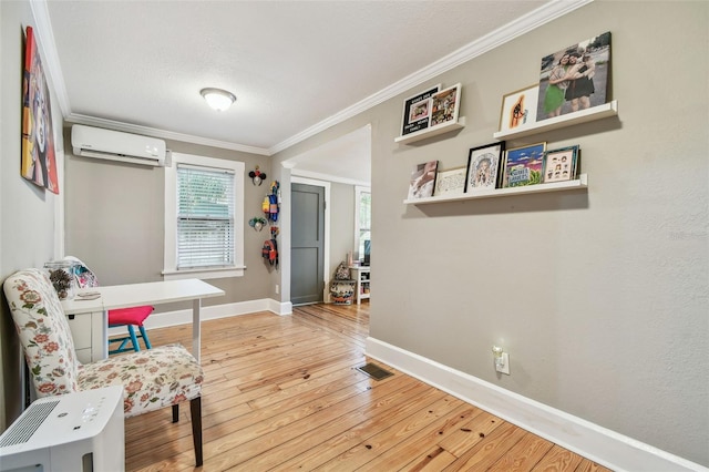 living area featuring crown molding, hardwood / wood-style floors, and an AC wall unit