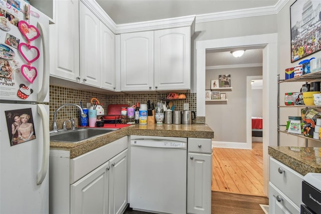 kitchen with white cabinetry, white appliances, and crown molding