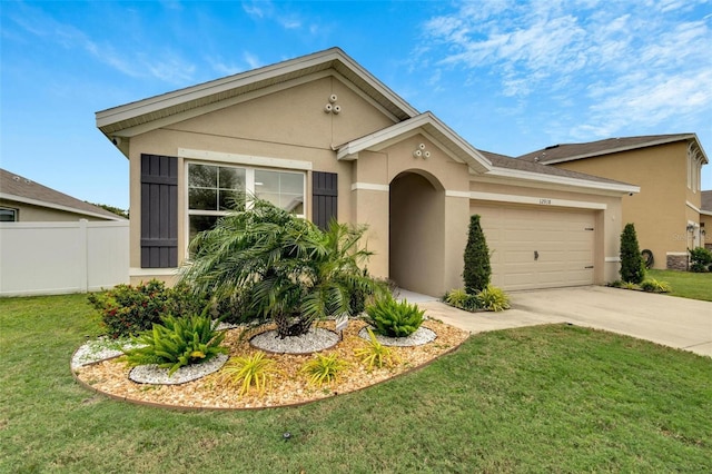 ranch-style home with a garage and a front lawn