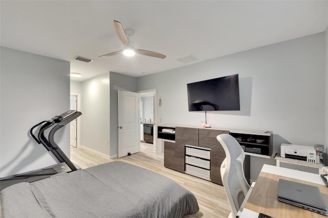 bedroom with ceiling fan and light hardwood / wood-style floors