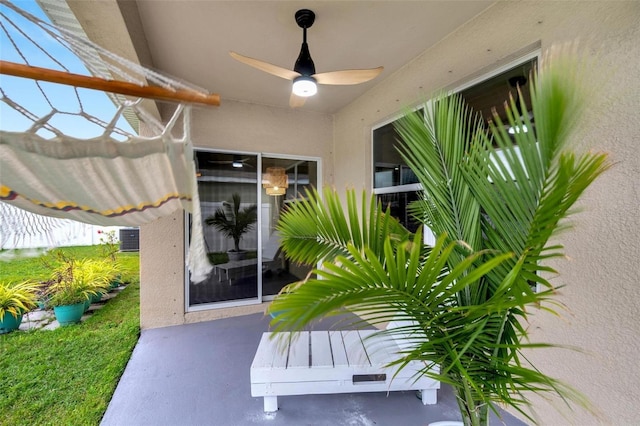 exterior space featuring cooling unit and ceiling fan