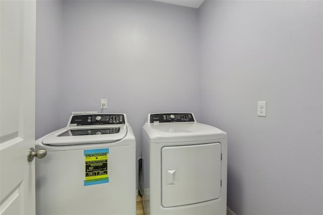 laundry room with washing machine and dryer and laundry area