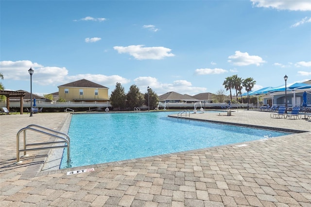 pool with a patio area