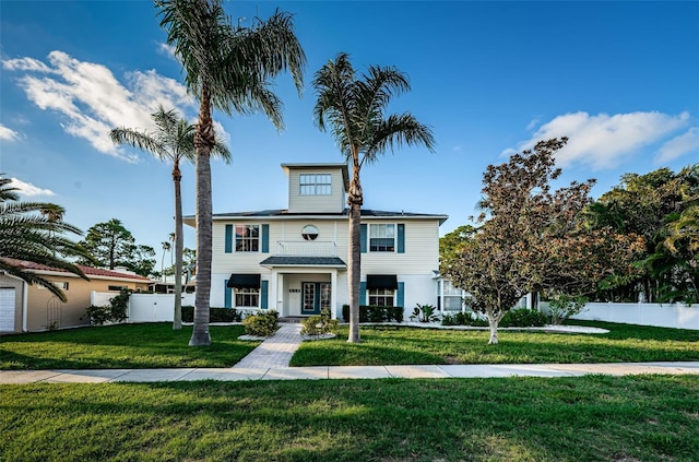 view of front of house with a front lawn