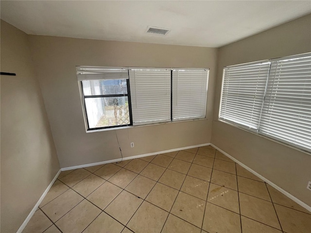 view of tiled spare room