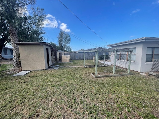 view of yard with a storage shed