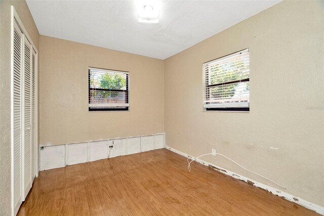 540 Florida Cir S, Apollo Beach, FL 33572 - empty room featuring wood finished floors