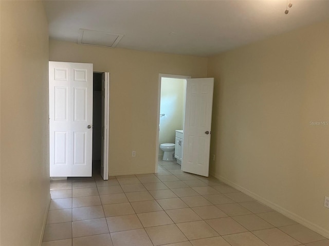 spare room with light tile patterned floors