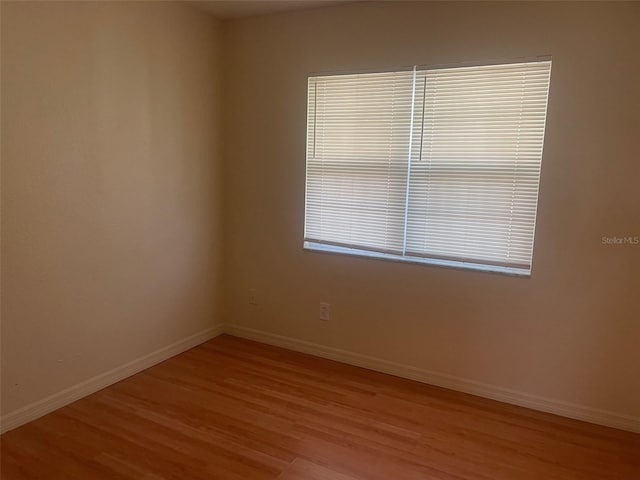 empty room with light wood-type flooring