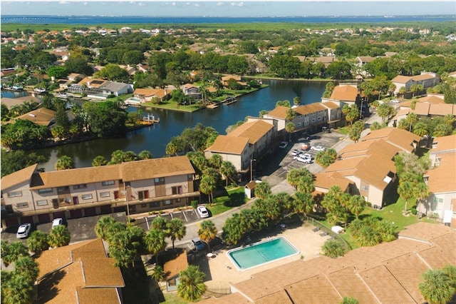 birds eye view of property featuring a water view