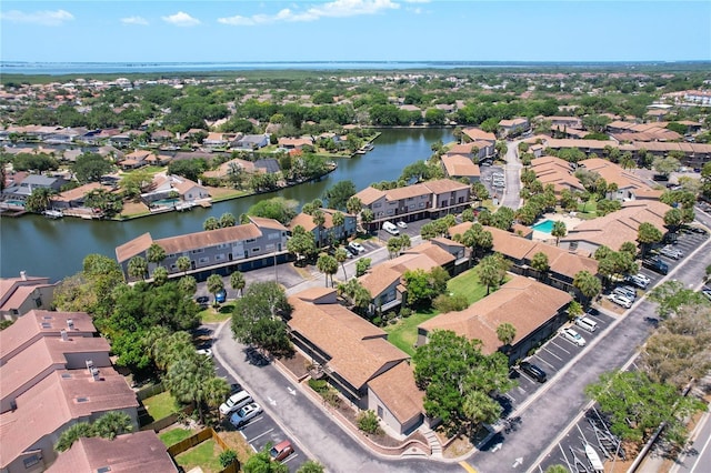 drone / aerial view with a water view