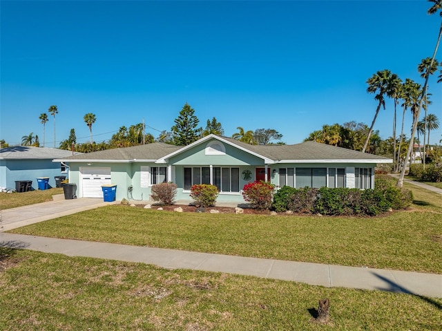 single story home with a garage and a front yard