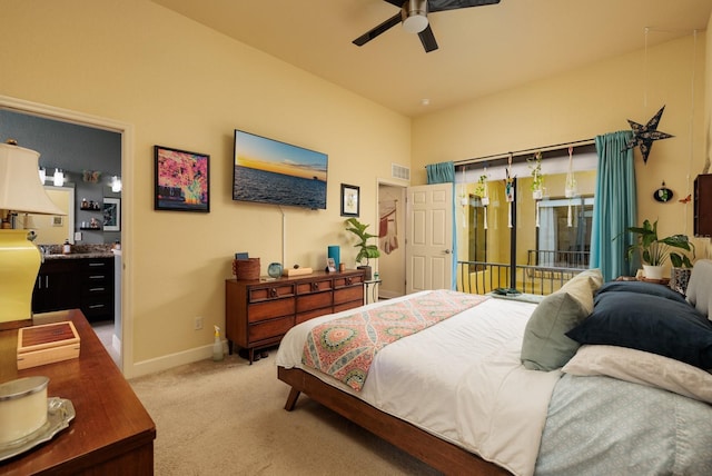 carpeted bedroom featuring access to outside and ceiling fan