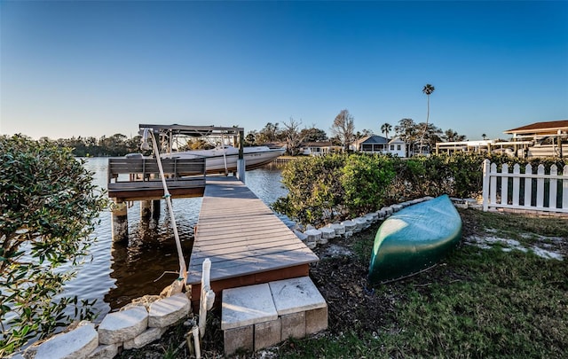 view of dock with a water view