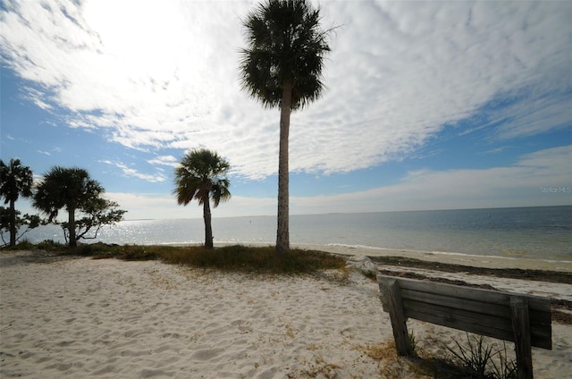 view of water feature with a beach view