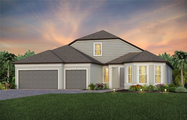 5243 SW 88th Cir, Ocala, FL 34481 - view of front of house with a garage and a yard