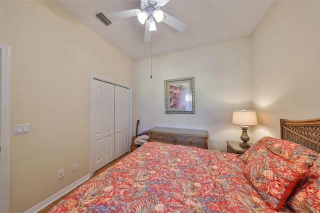 bedroom with ceiling fan and a closet