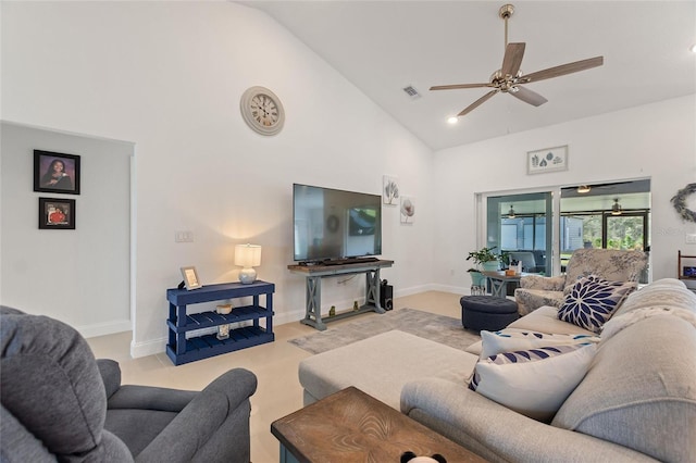 living room featuring ceiling fan and high vaulted ceiling