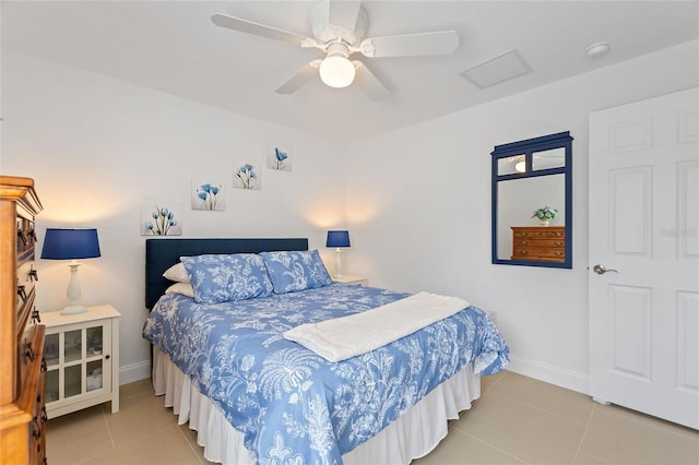 bedroom featuring light tile patterned floors and ceiling fan