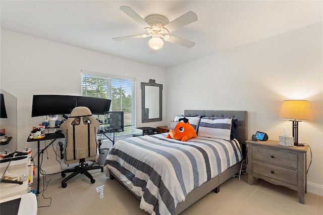 bedroom featuring light tile patterned floors and ceiling fan