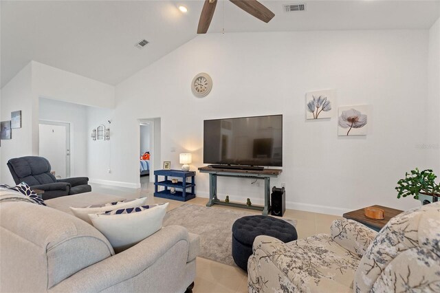 living room with high vaulted ceiling and ceiling fan