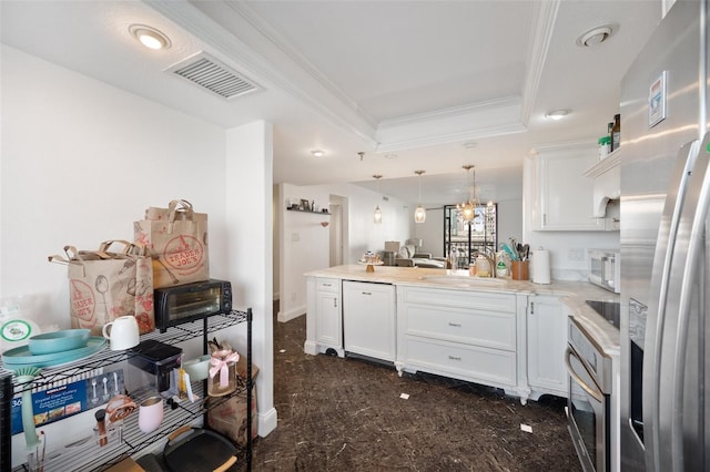 kitchen featuring white cabinetry, ornamental molding, a tray ceiling, pendant lighting, and stainless steel appliances