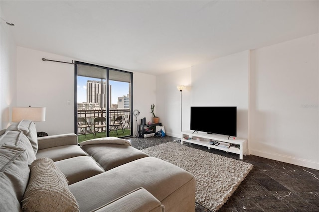 living room with floor to ceiling windows