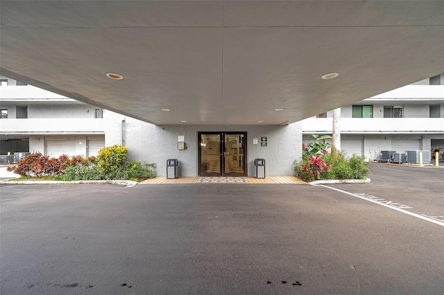 entrance to property with central AC unit