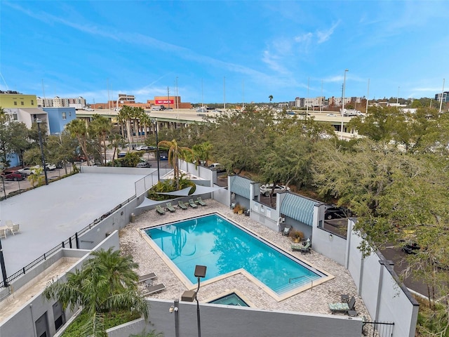 view of swimming pool with a patio