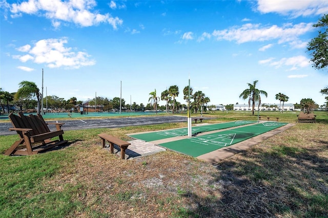 surrounding community with tennis court