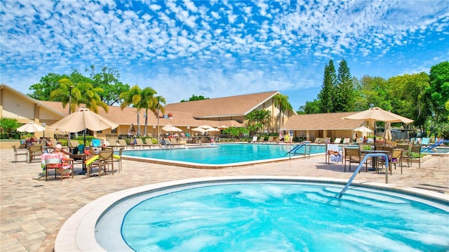 view of pool with a patio area