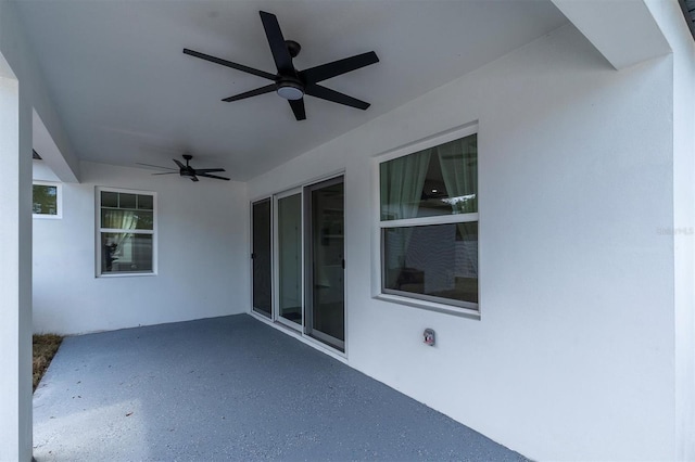 view of patio with ceiling fan