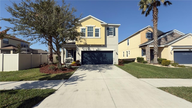 view of front facade with a garage and a front lawn