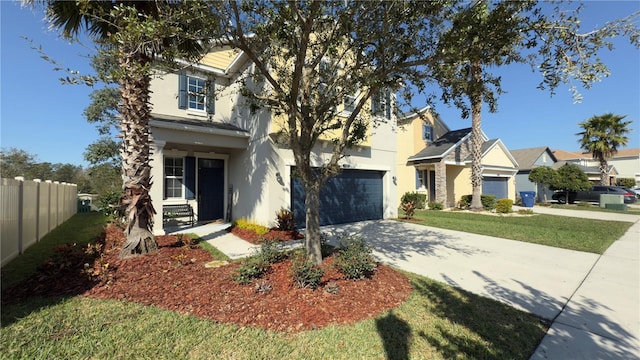 view of front of property with a garage and a front yard