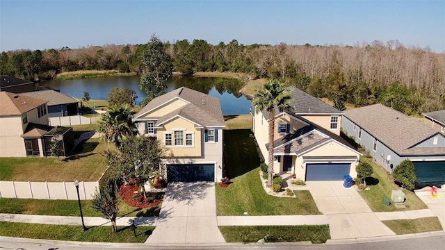 bird's eye view with a water view