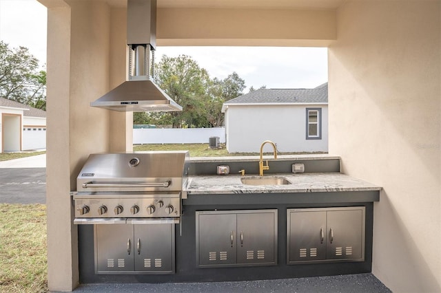 view of patio featuring area for grilling, sink, cooling unit, and grilling area