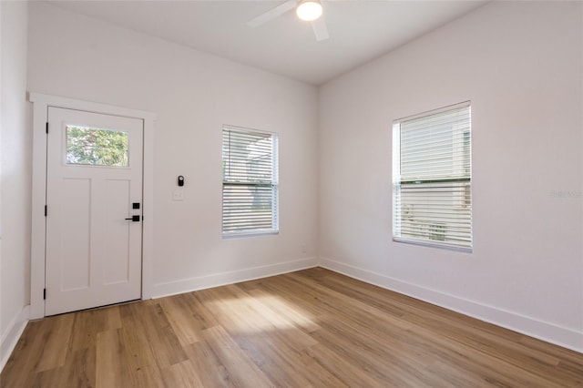 entrance foyer featuring ceiling fan and light hardwood / wood-style floors