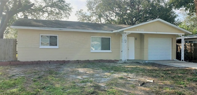 single story home with a garage