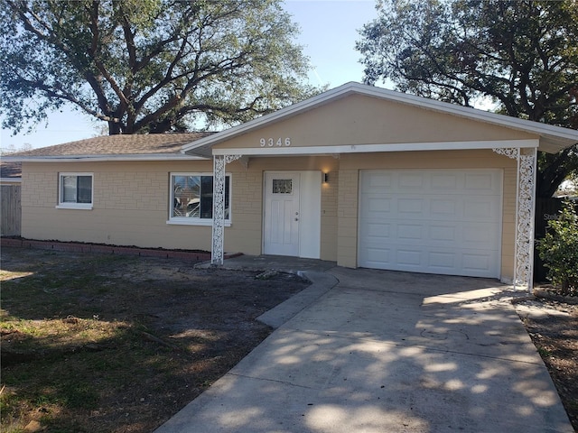 ranch-style home with a garage