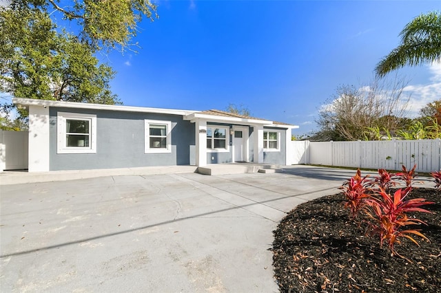 back of property featuring a patio