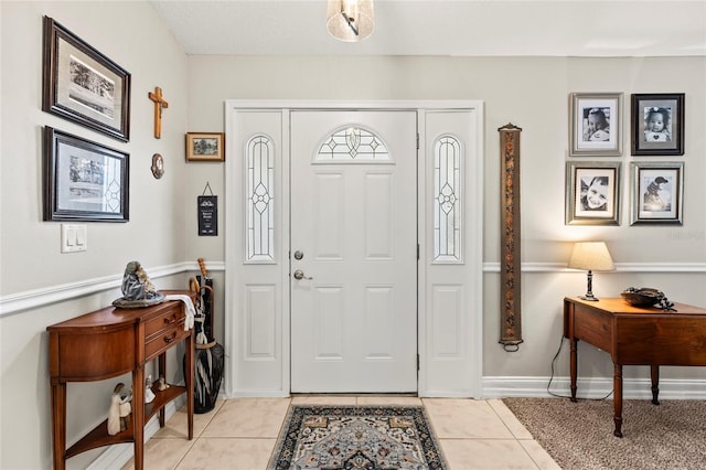 entryway featuring light tile patterned floors