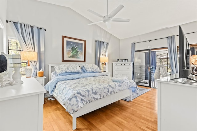 bedroom featuring vaulted ceiling, access to outside, ceiling fan, and light hardwood / wood-style floors