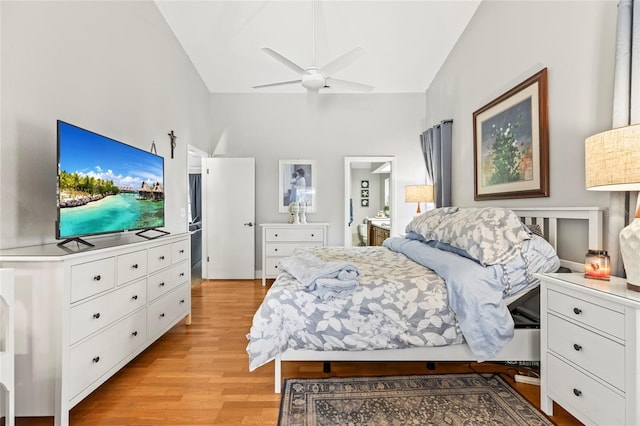 bedroom featuring vaulted ceiling, ceiling fan, and light hardwood / wood-style flooring