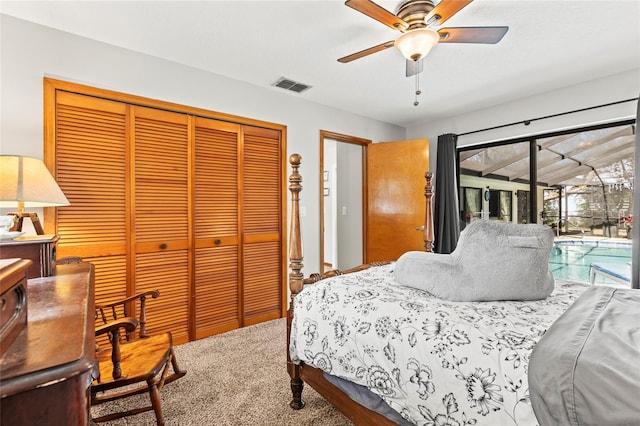 carpeted bedroom with access to outside, a closet, and ceiling fan