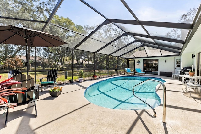 view of pool featuring a lanai and a patio area