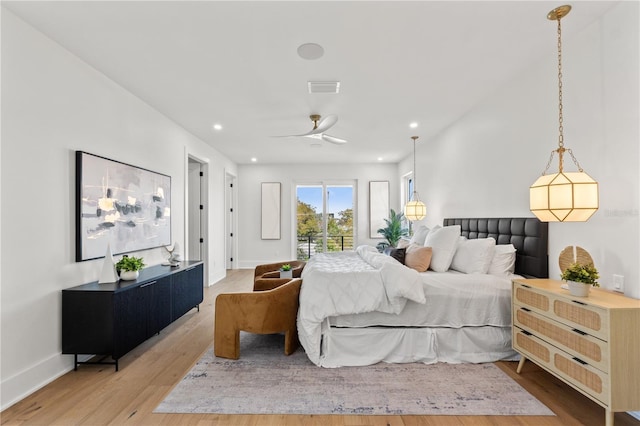 bedroom with baseboards, visible vents, wood finished floors, access to exterior, and recessed lighting